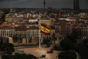 A Spanish flag flies at half staff, for the victims of the Germanwings passenger jet, in Madrid, Spain. Wed, March 25, 2015. | source: ECS Group A Spanish flag flies at half staff, for the victims of the Germanwings passenger jet, in Madrid, Spain. Wed, March 25, 2015. | source: ECS Group